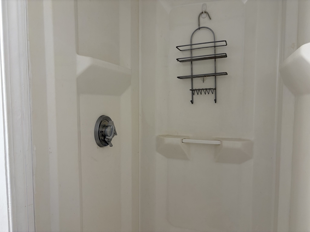 57 Coburn Avenue, Unit 2 Worcester, MA 01604 - Photo 38 of 42 a bathroom with a shower