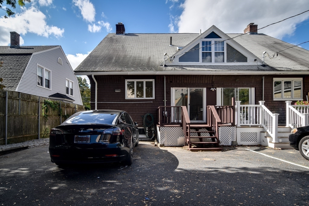 57 Coburn Avenue, Unit 2 Worcester, MA 01604 - Photo 41 of 42 a car parked in front of a house
