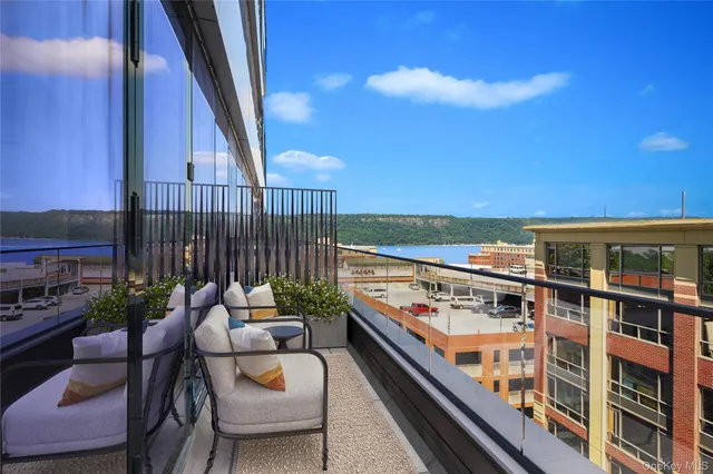 a balcony with hardwood