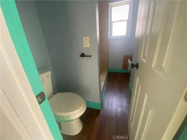 a bathroom with a toilet and a sink