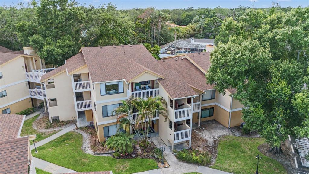 1550 South Belcher Road, Unit 525 Clearwater, FL 33764 - Photo 25 of 28 front view of a house with a yard