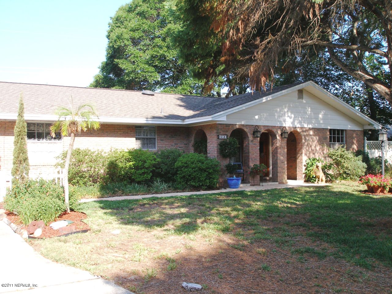 518 Gentian Road St. Augustine, FL 32086 - Photo 1 of 26 a view of a house with backyard porch and sitting area