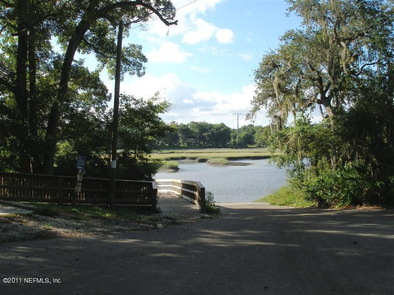 518 Gentian Road St. Augustine, FL 32086 - Photo 24 of 26 a lake view with wooden fence