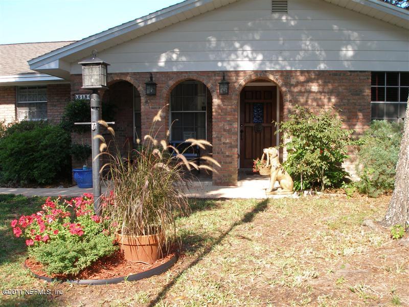 518 Gentian Road St. Augustine, FL 32086 - Photo 3 of 26 a front view of house with yard