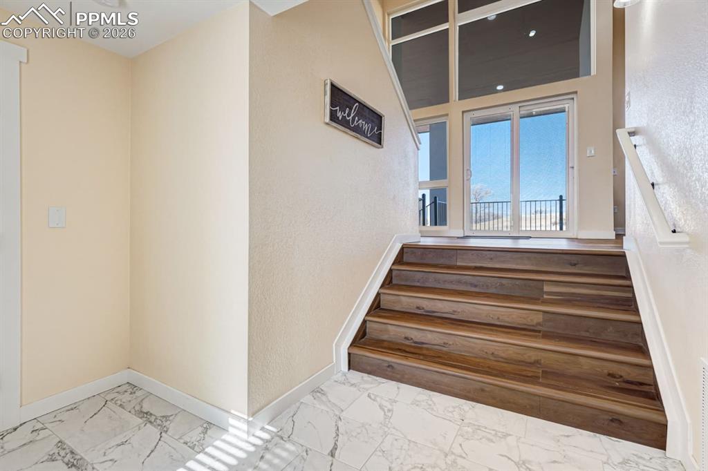 10108 Rolling Ridge Road Colorado Springs, CO 80925 - Photo 32 of 32 a view of entryway