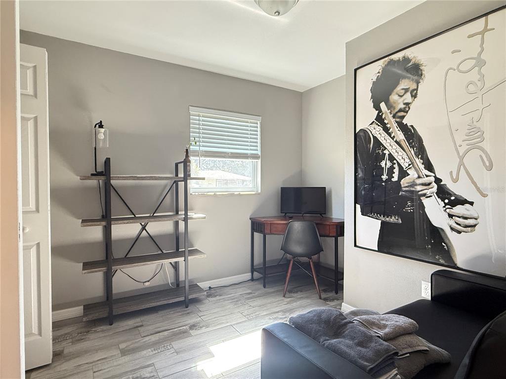 6809 Northwest 60th Street Ocala, FL 34482 - Photo 25 of 46 a living room with furniture and a window