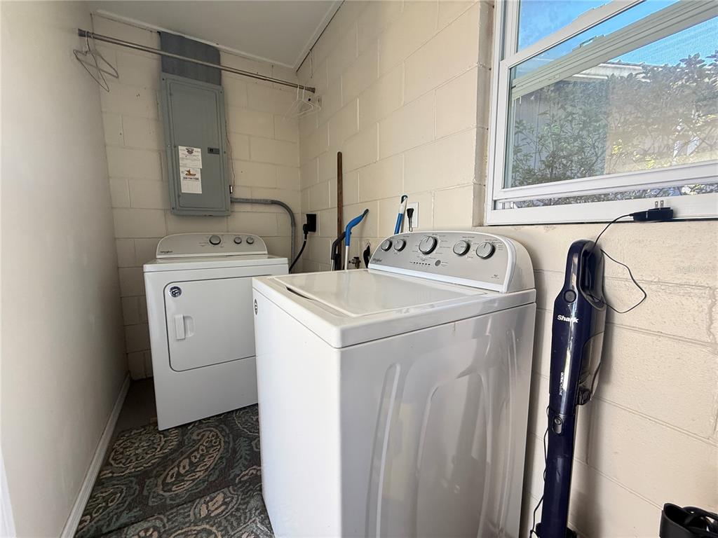 6809 Northwest 60th Street Ocala, FL 34482 - Photo 29 of 46 a utility room with dryer and washer