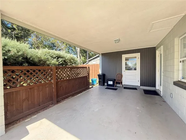 a view of backyard with green space