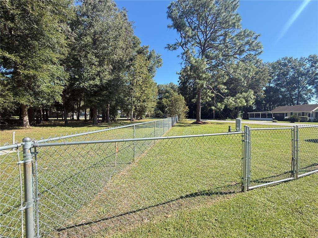 6809 Northwest 60th Street Ocala, FL 34482 - Photo 44 of 46 a view of a tennis court