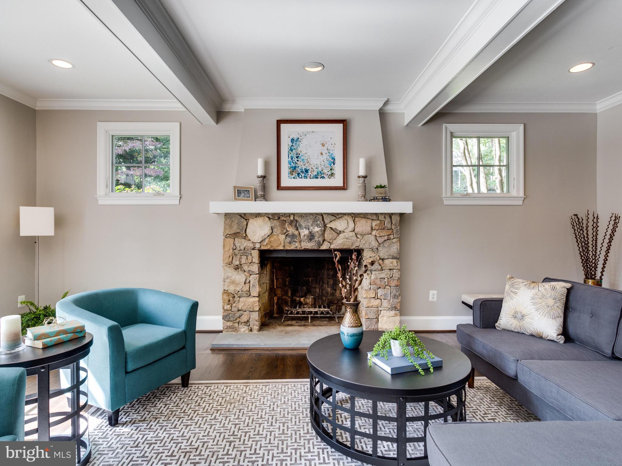 1700 Crescent Lane McLean, VA 22201 - Photo 13 of 30 a living room with furniture a window and a fireplace
