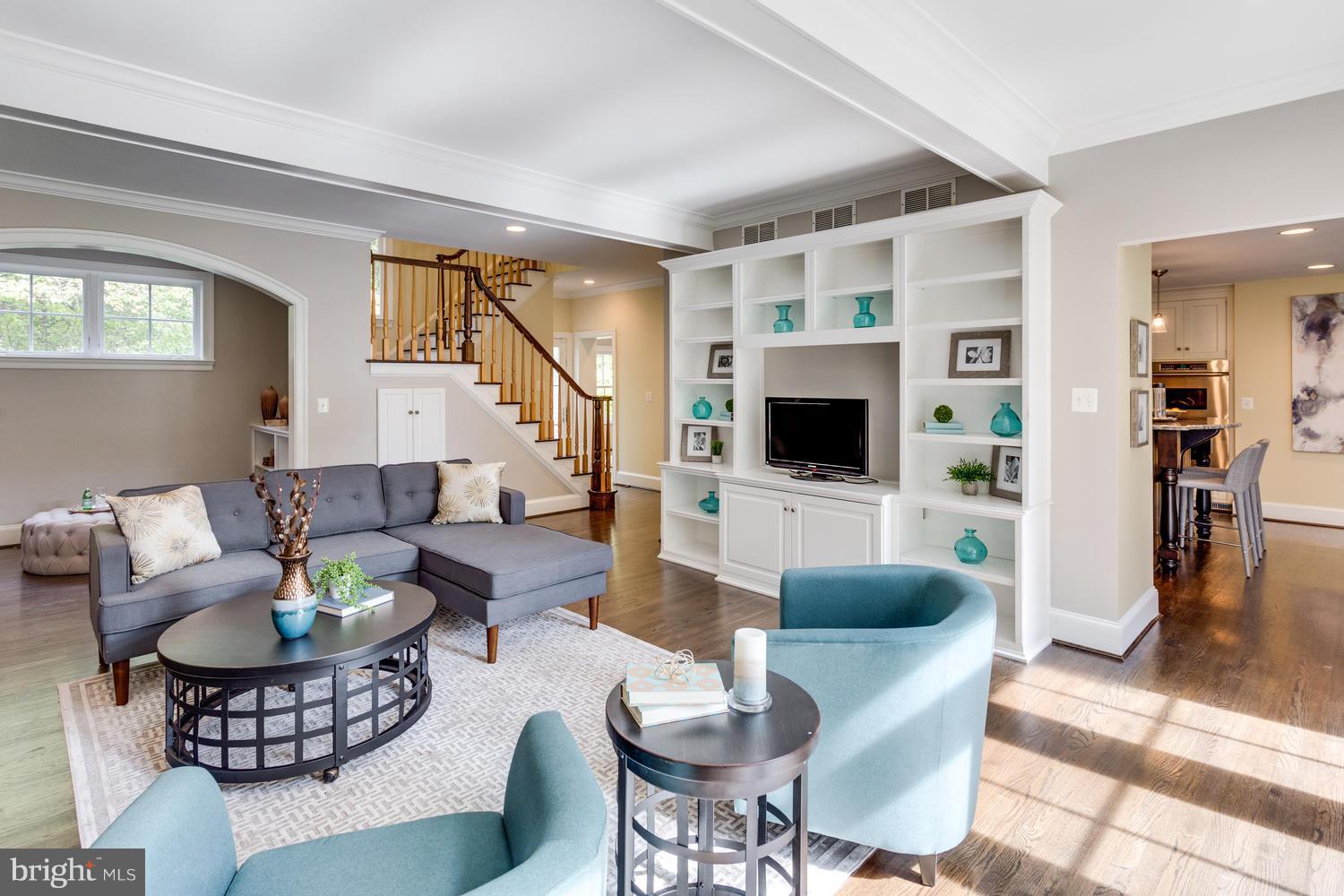 1700 Crescent Lane McLean, VA 22201 - Photo 14 of 30 a living room with furniture a flat screen tv and a view of kitchen