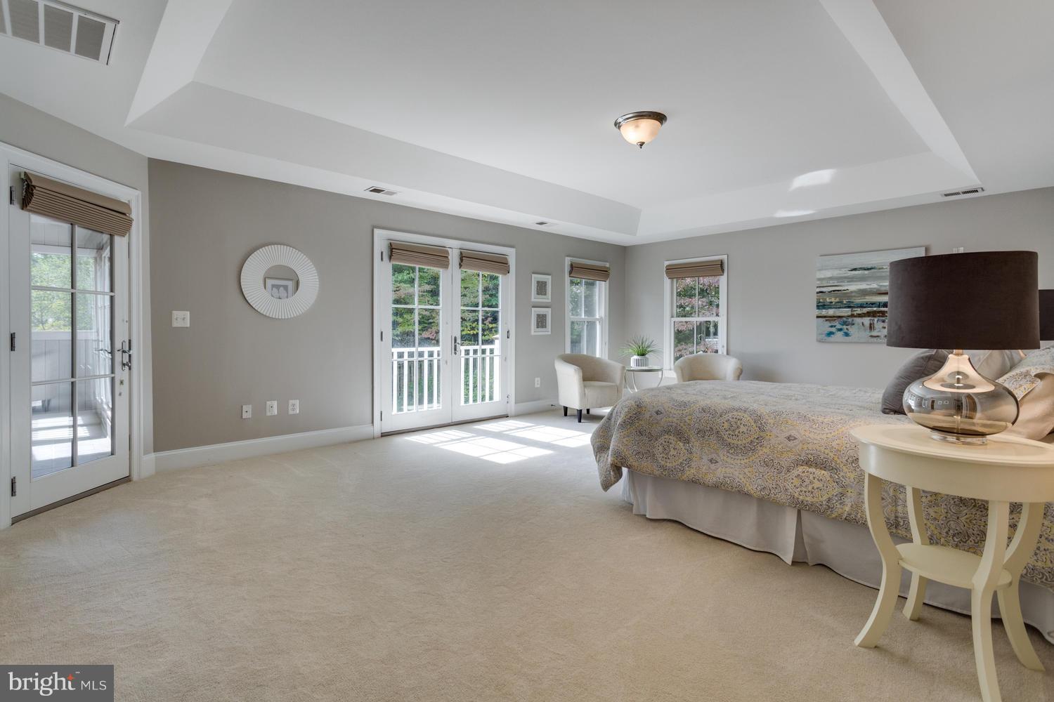 1700 Crescent Lane McLean, VA 22201 - Photo 16 of 30 a bedroom with a bed and glass door