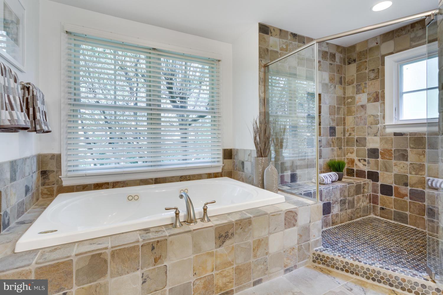 1700 Crescent Lane McLean, VA 22201 - Photo 19 of 30 a bathroom with a bathtub and a shower
