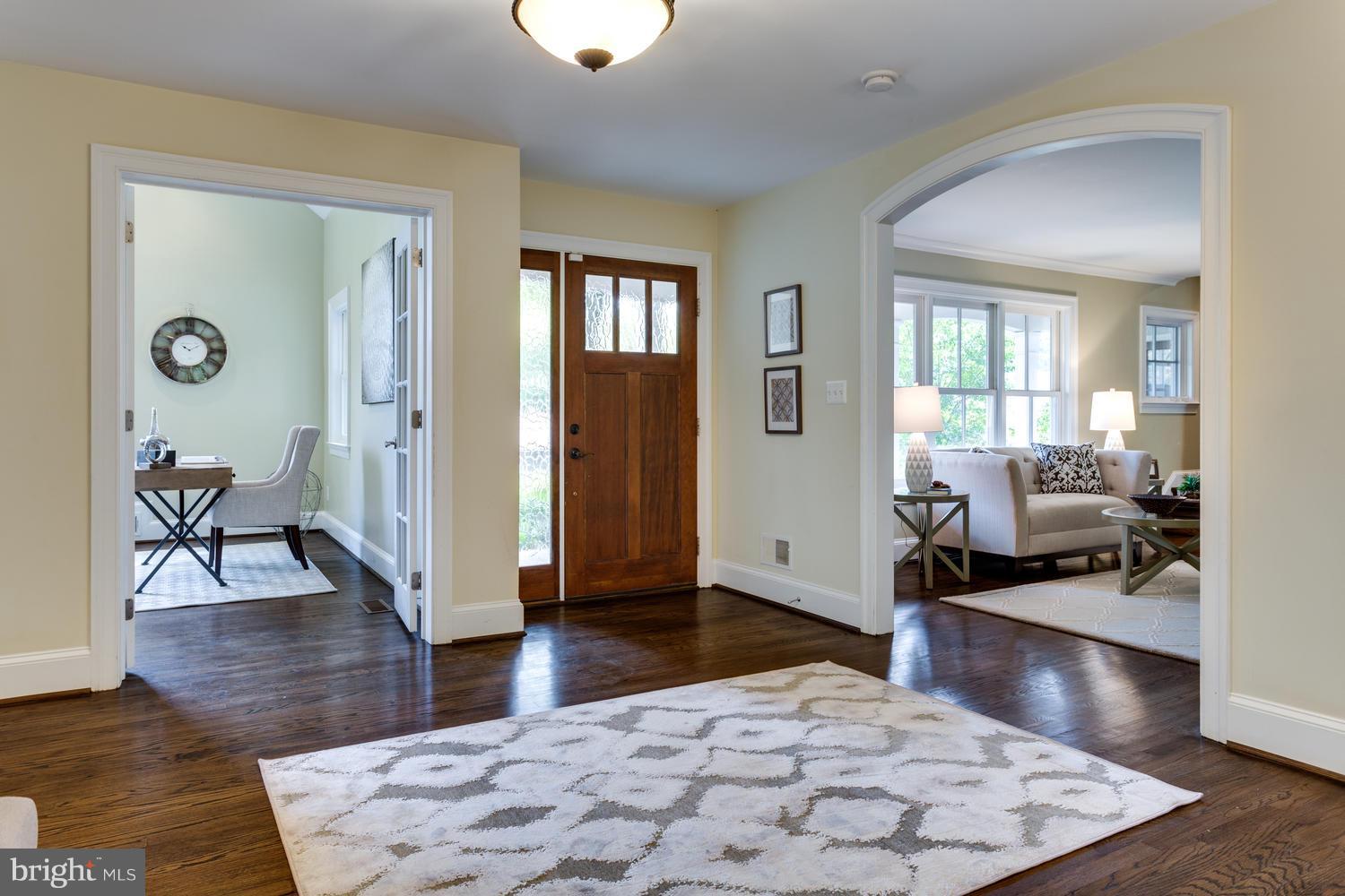 1700 Crescent Lane McLean, VA 22201 - Photo 3 of 30 a living room with furniture rug and wooden floor