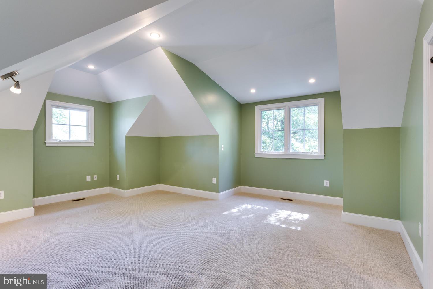 1700 Crescent Lane McLean, VA 22201 - Photo 23 of 30 a view of an empty room with window and wooden floor