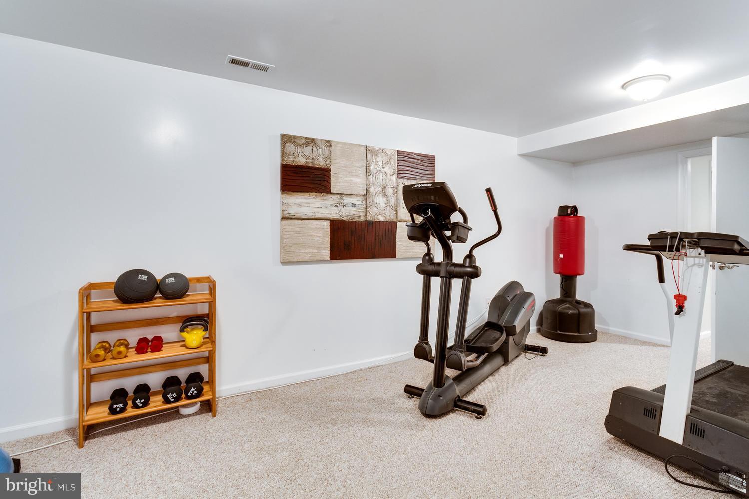 1700 Crescent Lane McLean, VA 22201 - Photo 26 of 30 a room with gym equipment and equipment