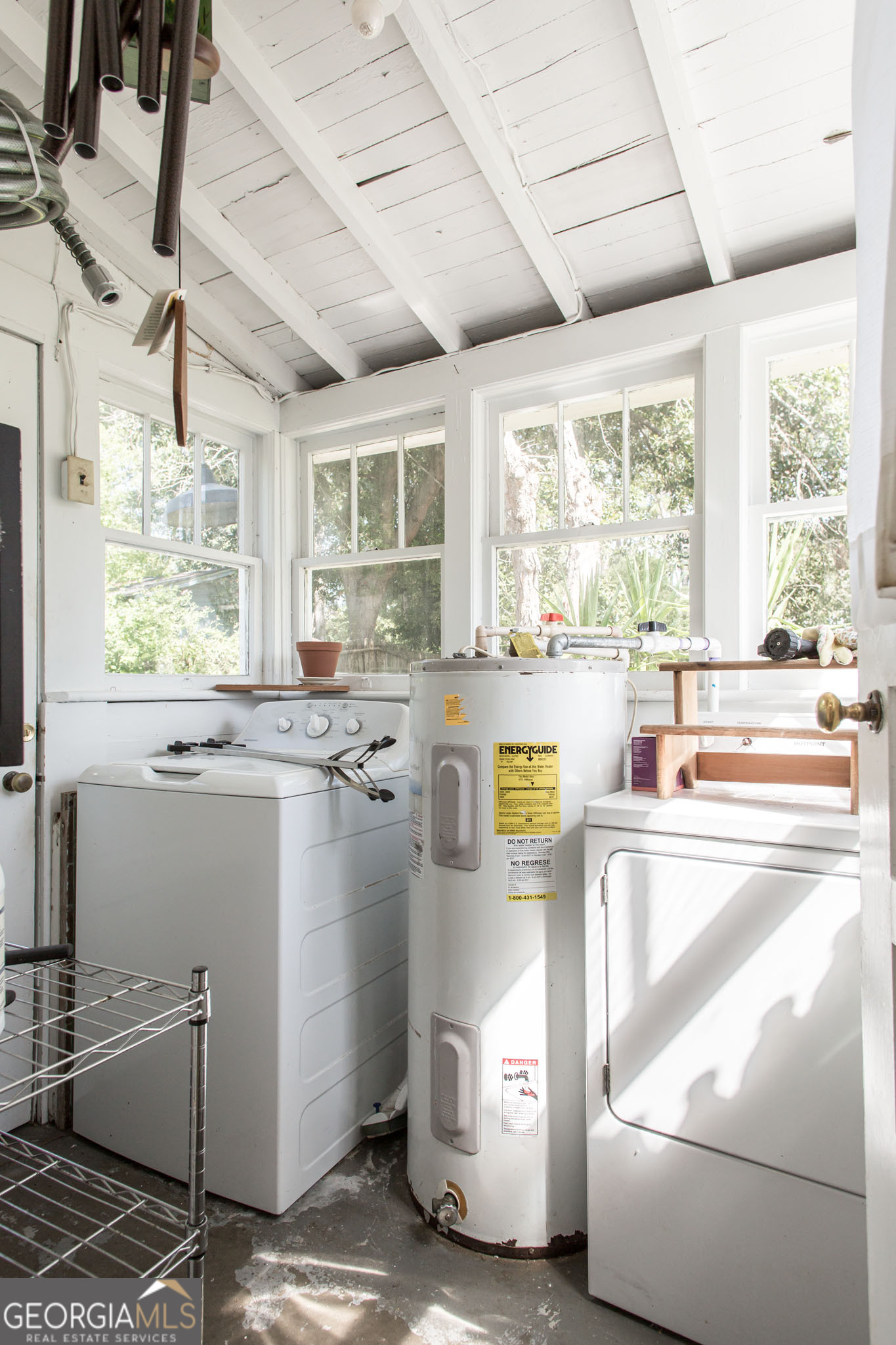 1009 Euclid Avenue Waycross, GA 31501 - Photo 13 of 35 a kitchen with sink cabinets and window