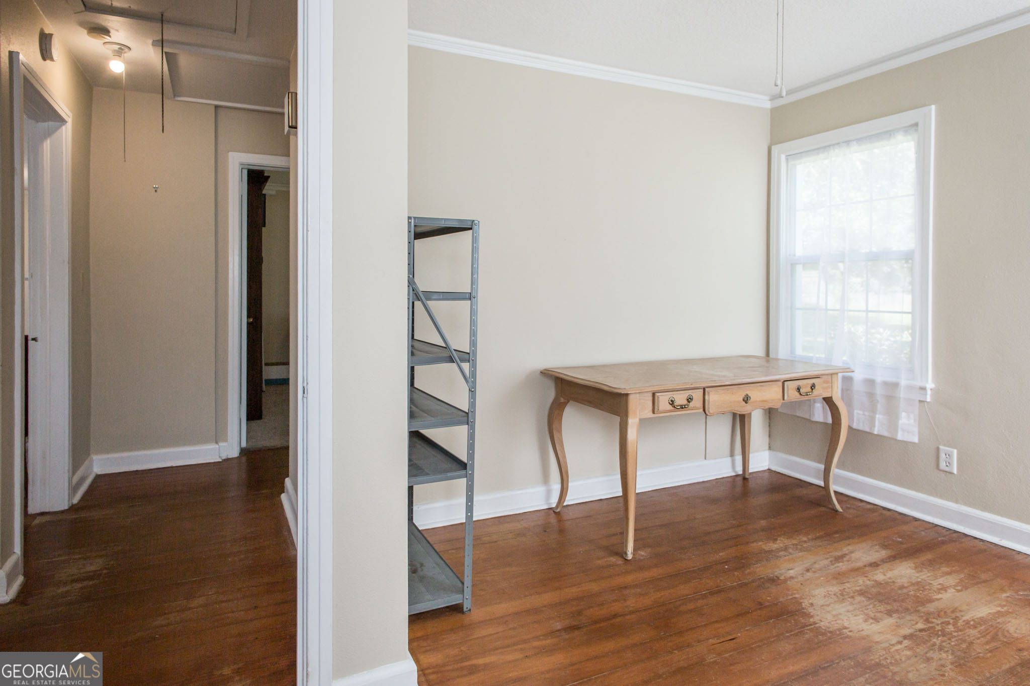 1009 Euclid Avenue Waycross, GA 31501 - Photo 21 of 35 a view of a livingroom with furniture and wooden floor