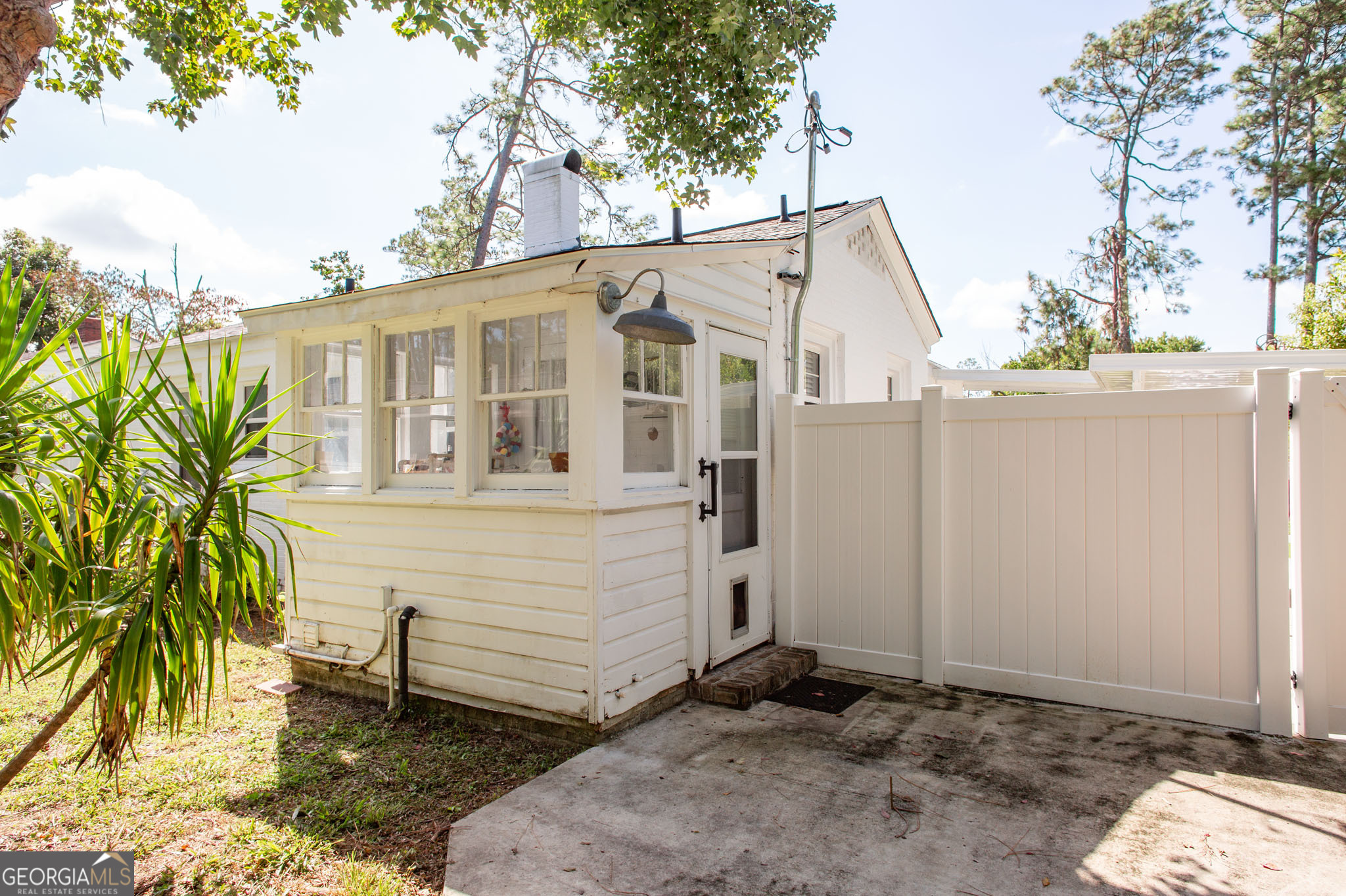 1009 Euclid Avenue Waycross, GA 31501 - Photo 33 of 35 a view of a house with a yard