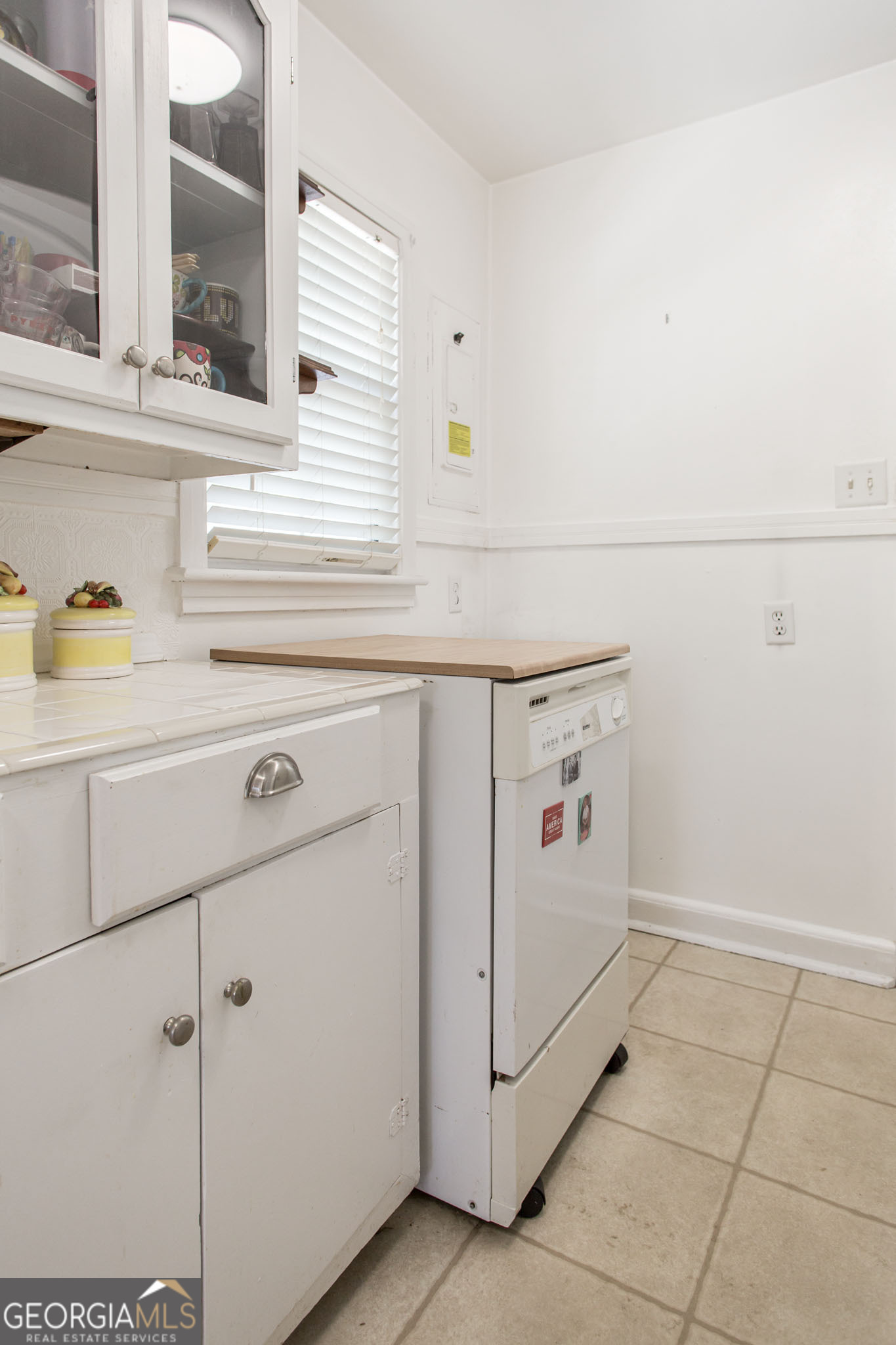 1009 Euclid Avenue Waycross, GA 31501 - Photo 10 of 35 a view of a storage & utility room with a washer dryer