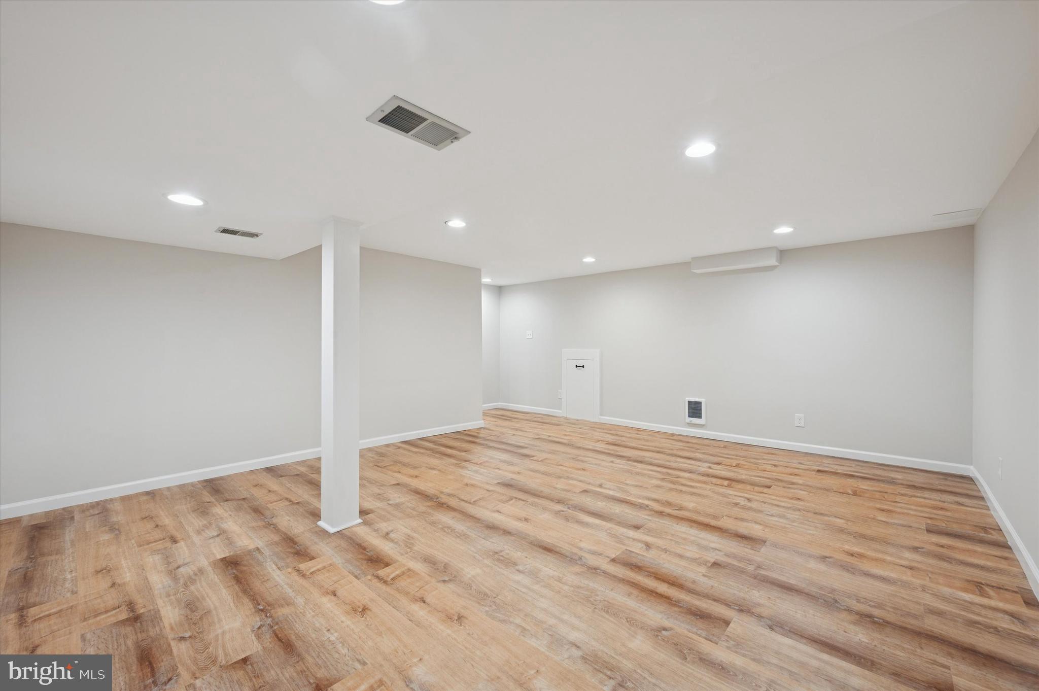 421 Lawrence Road Havertown, PA 19083 - Photo 18 of 25 a view of empty room with wooden floor