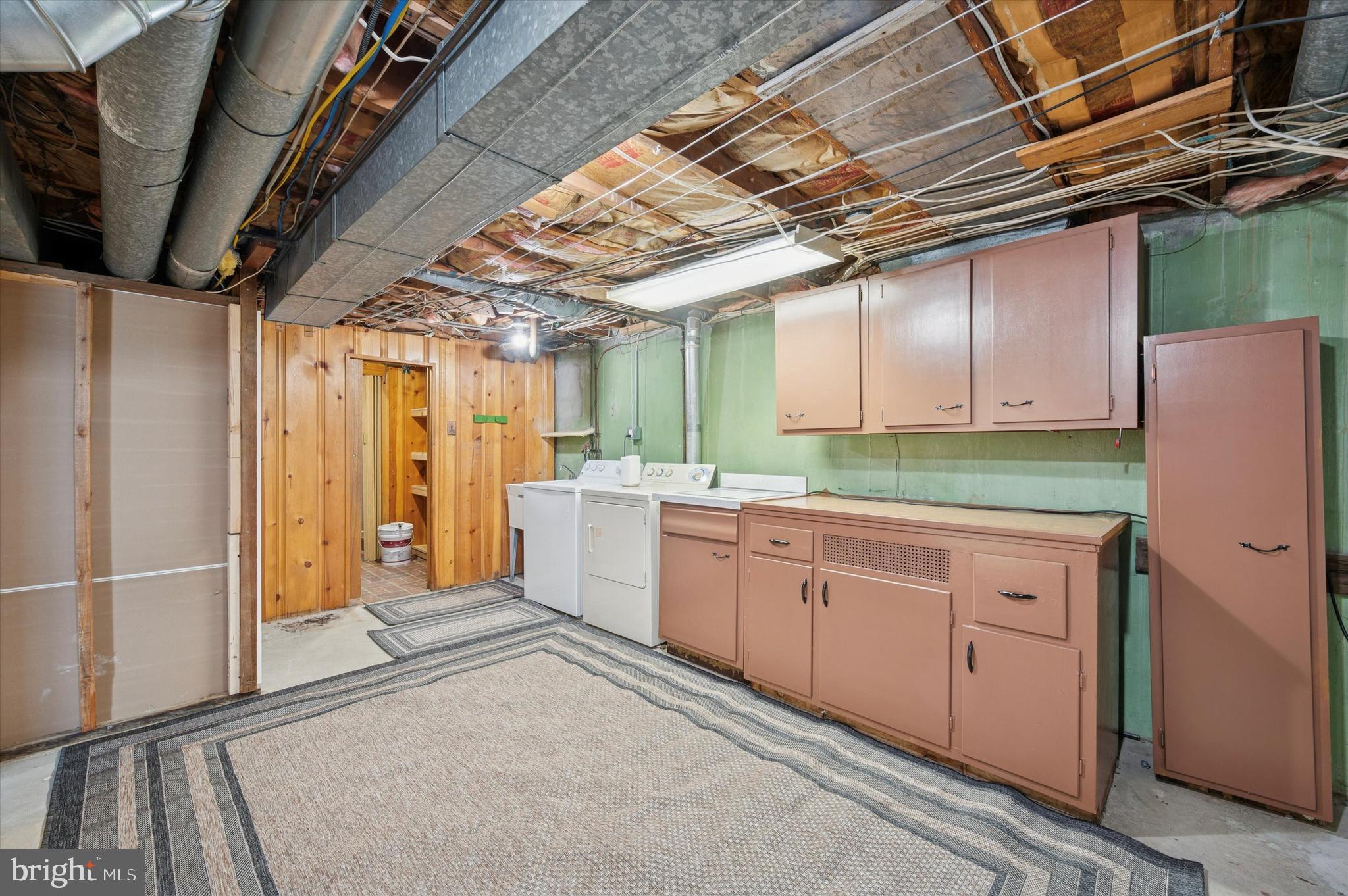 421 Lawrence Road Havertown, PA 19083 - Photo 21 of 25 a large kitchen with a refrigerator and window