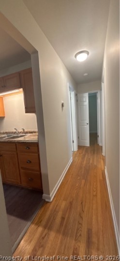 1070 Rulnick Street Fayetteville, NC 28304 - Photo 8 of 15 a view of a hallway with wooden floor