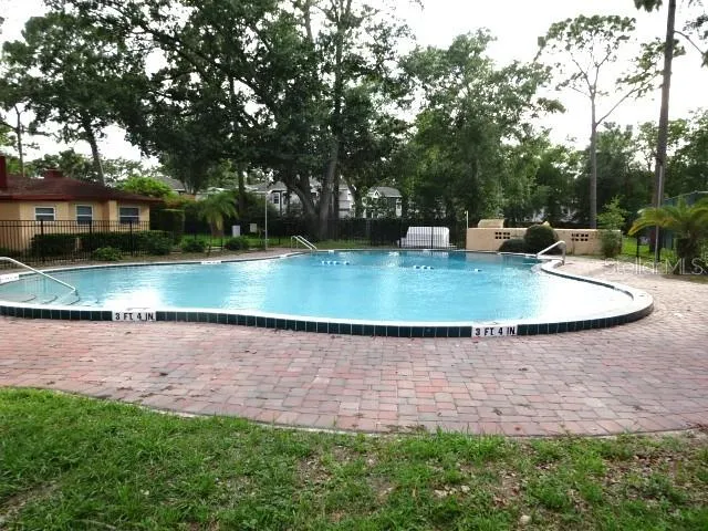 a view of a backyard with a patio