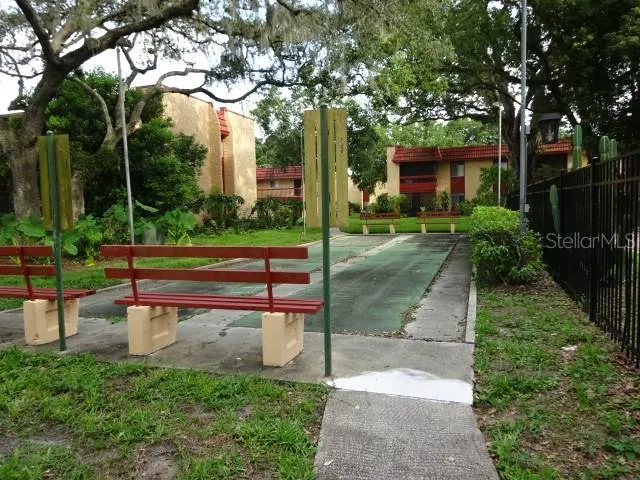 a view of a bench in a garden