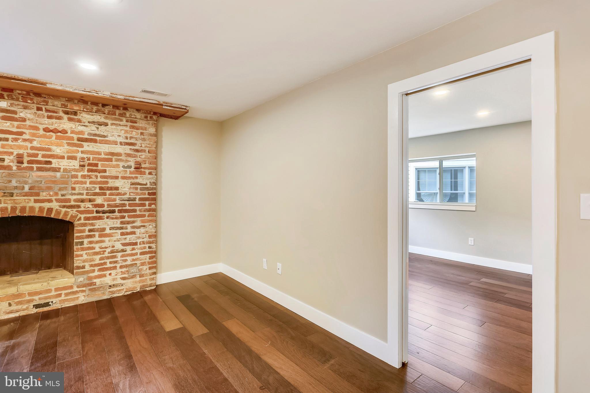 6 Circle Circle Washington Grove, MD 20880 - Photo 18 of 45 a view of an empty room and wooden floor