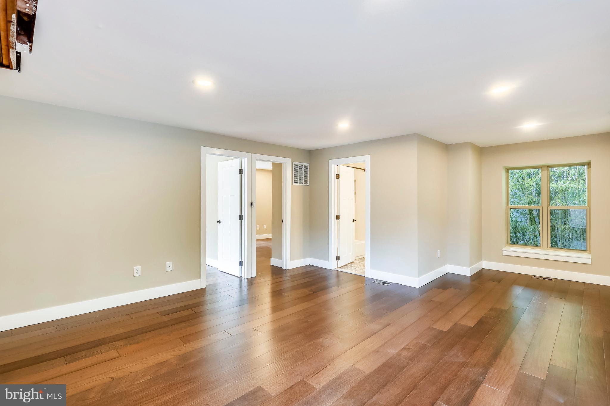 6 Circle Circle Washington Grove, MD 20880 - Photo 31 of 45 a view of an empty room with wooden floor and windows
