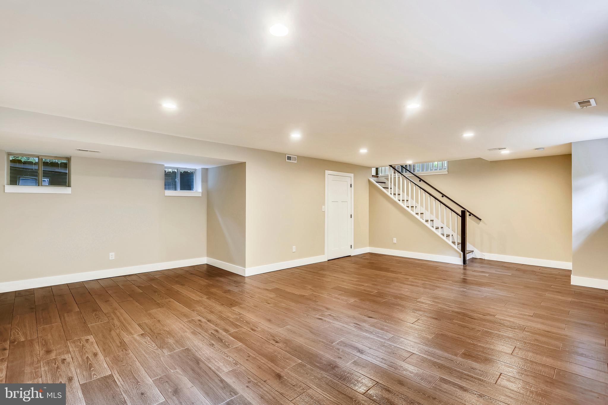 6 Circle Circle Washington Grove, MD 20880 - Photo 38 of 45 a view of an empty room with wooden floor