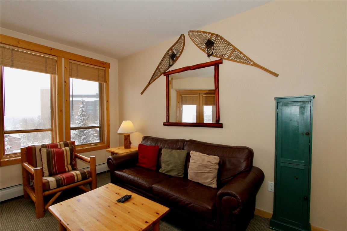 172 Copper Circle, Unit 301 Copper Mountain, CO 80443 - Photo 12 of 23 a living room with furniture and a window