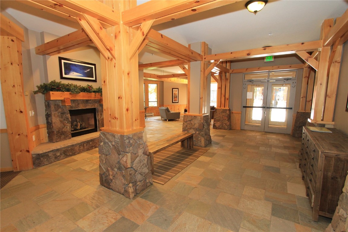 172 Copper Circle, Unit 301 Copper Mountain, CO 80443 - Photo 22 of 23 a living room with furniture and a fireplace