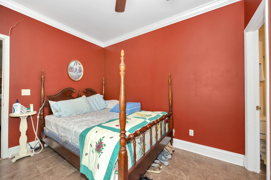 84 Scott Orchard Road Taft, TN 38488 - Photo 17 of 23 a bedroom with a bed and a window
