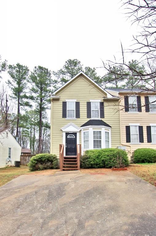 3462 Kingswood Run Decatur, GA 30034 - Photo 1 of 1 a front view of a house with a yard