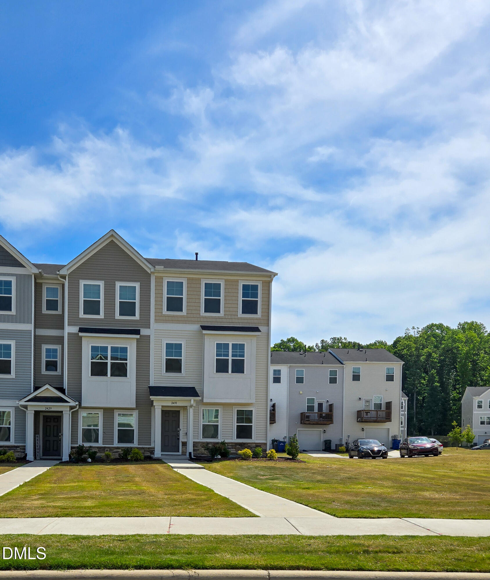 2431 Kasota Lane Raleigh, NC 27610 - Photo 1 of 46 a view of houses with outdoor space and lakeside