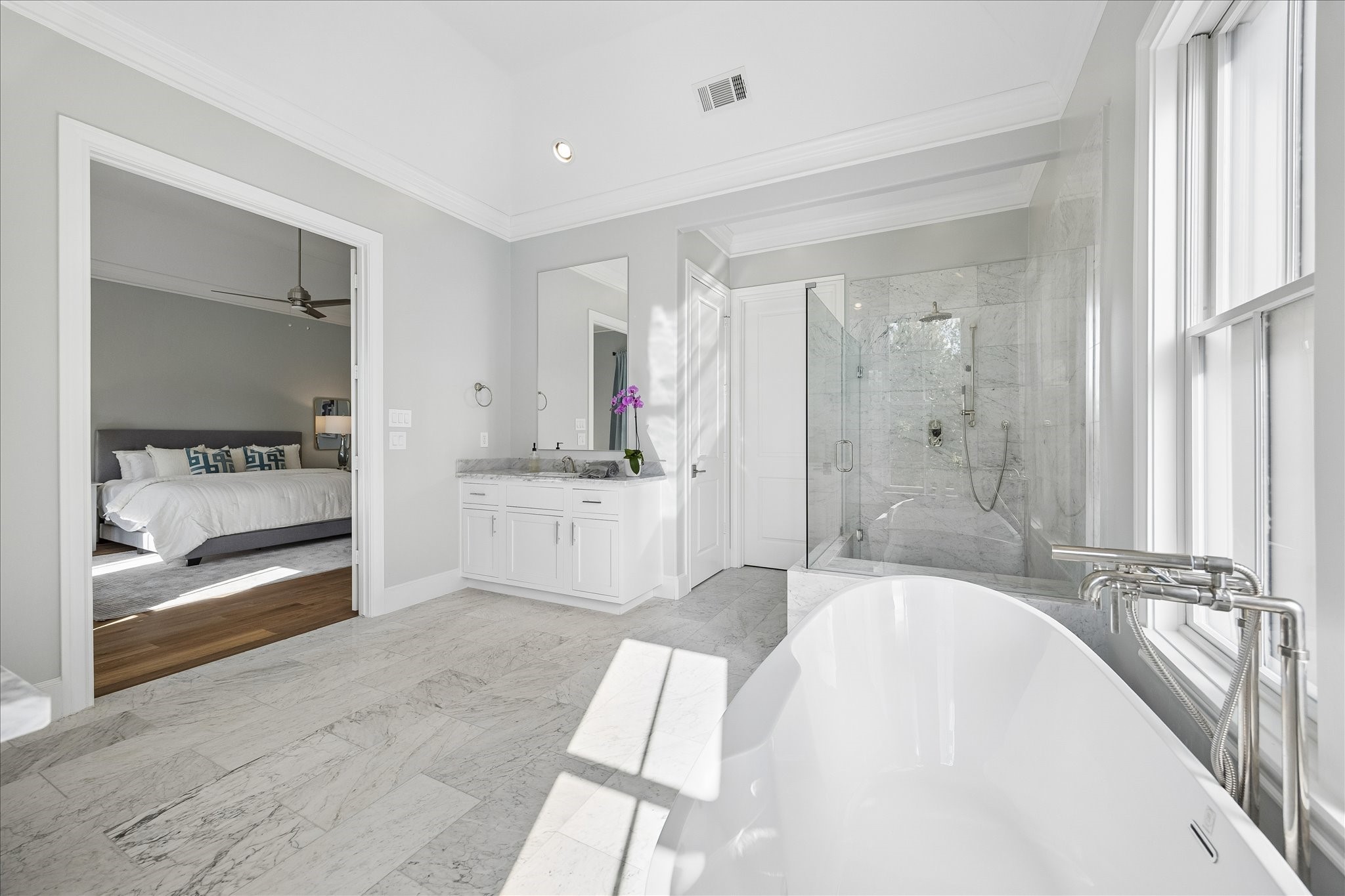 3020 Lake Street Houston, TX 77098 - Photo 27 of 41 A large closet with desk-makeup area is located thru the primary bath. The second closet is accessed from the bedroom.