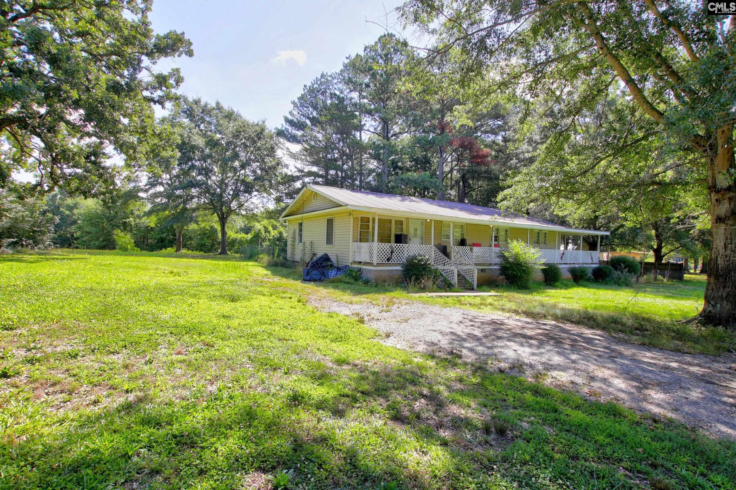 3140 Highway 702 Chappells, SC 29037 - Photo 28 of 39 a view of an house with backyard space and balcony