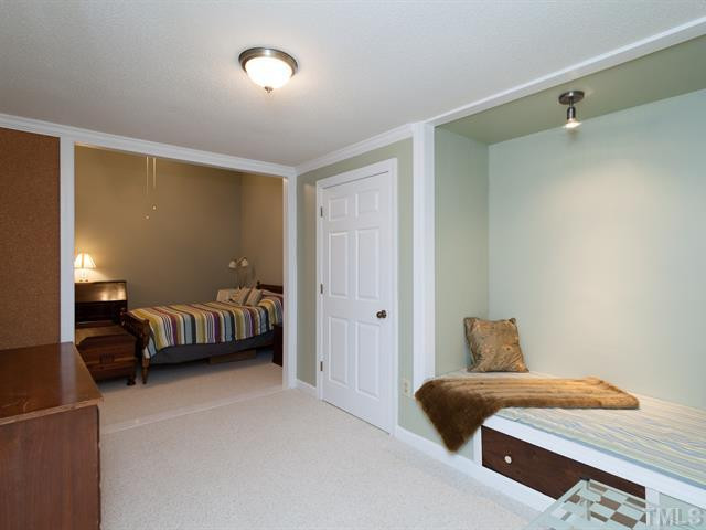 1929 Partridge Berry Drive Raleigh, NC 27606 - Photo 23 of 25 Downstairs there is also a bedroom with small bonus area. Basement