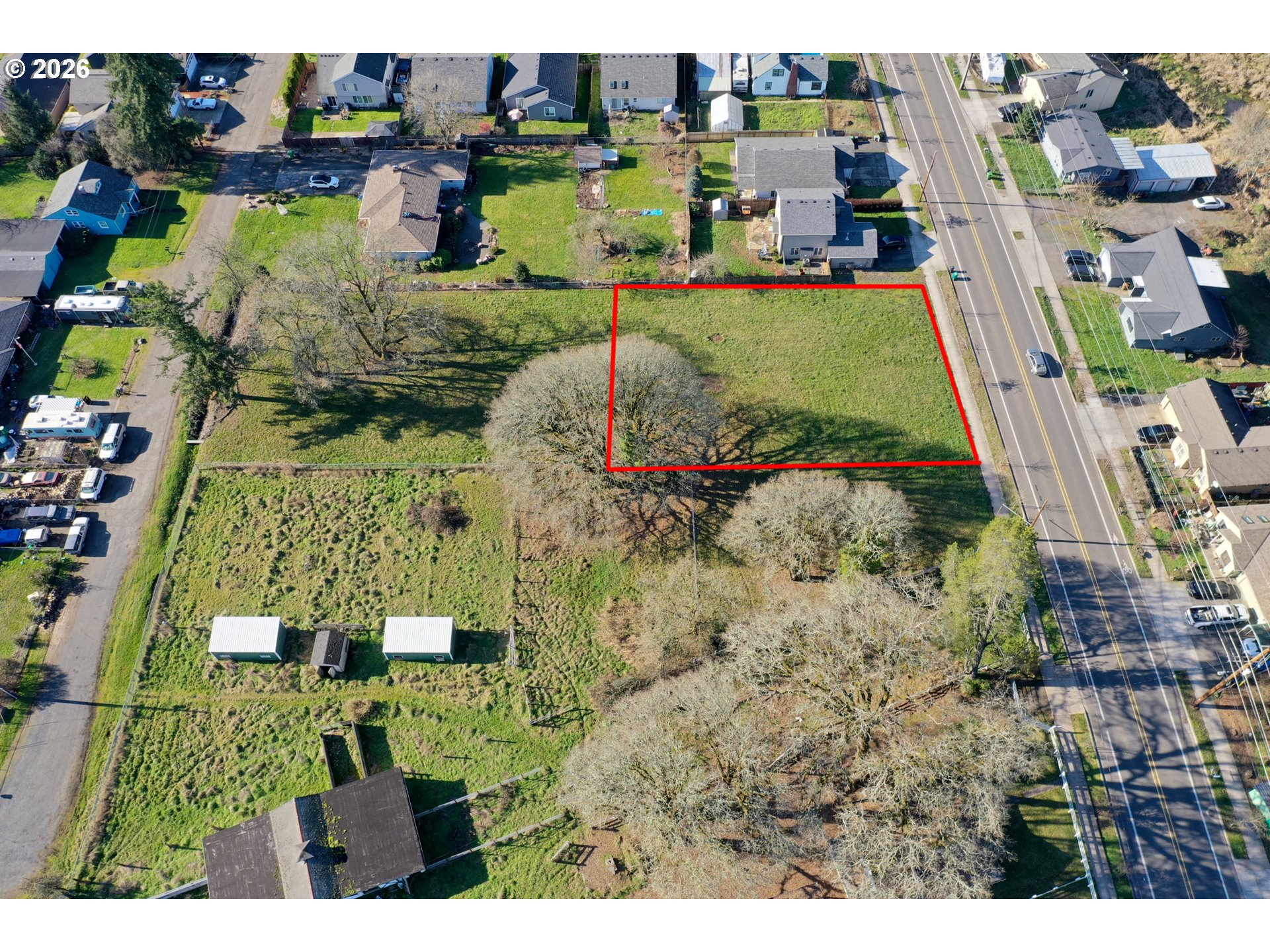2695 Gable Road St. Helens, OR 97051 - Photo 7 of 8 a view of a lake with a building in the background