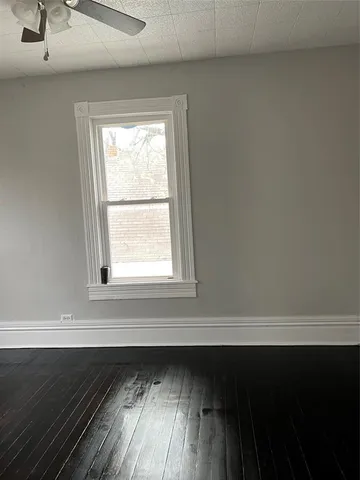 a view of a room that has a window