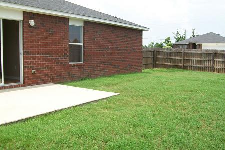295 Limestone Circle Crestview, FL 32539 - Photo 2 of 11 a backyard of a house with lots of green space
