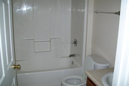 295 Limestone Circle Crestview, FL 32539 - Photo 10 of 11 a bathroom with a sink a toilet and shower