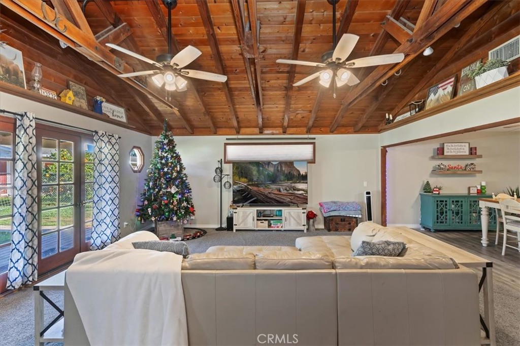 1441 Fifth Street Norco, CA 92860 - Photo 21 of 72 a living room with a couch and a large window