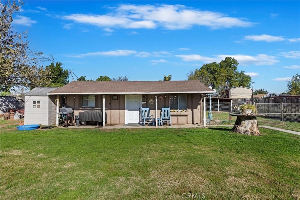 1441 Fifth Street Norco, CA 92860 - Photo 42 of 72 a view of a house with a big yard and large trees