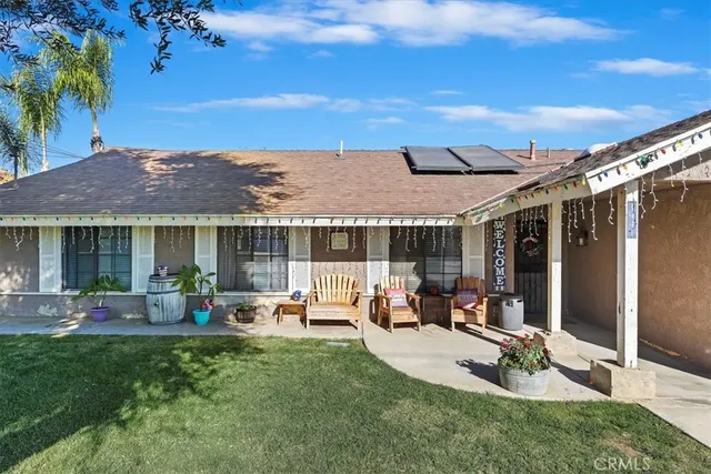 front view of a house with a patio