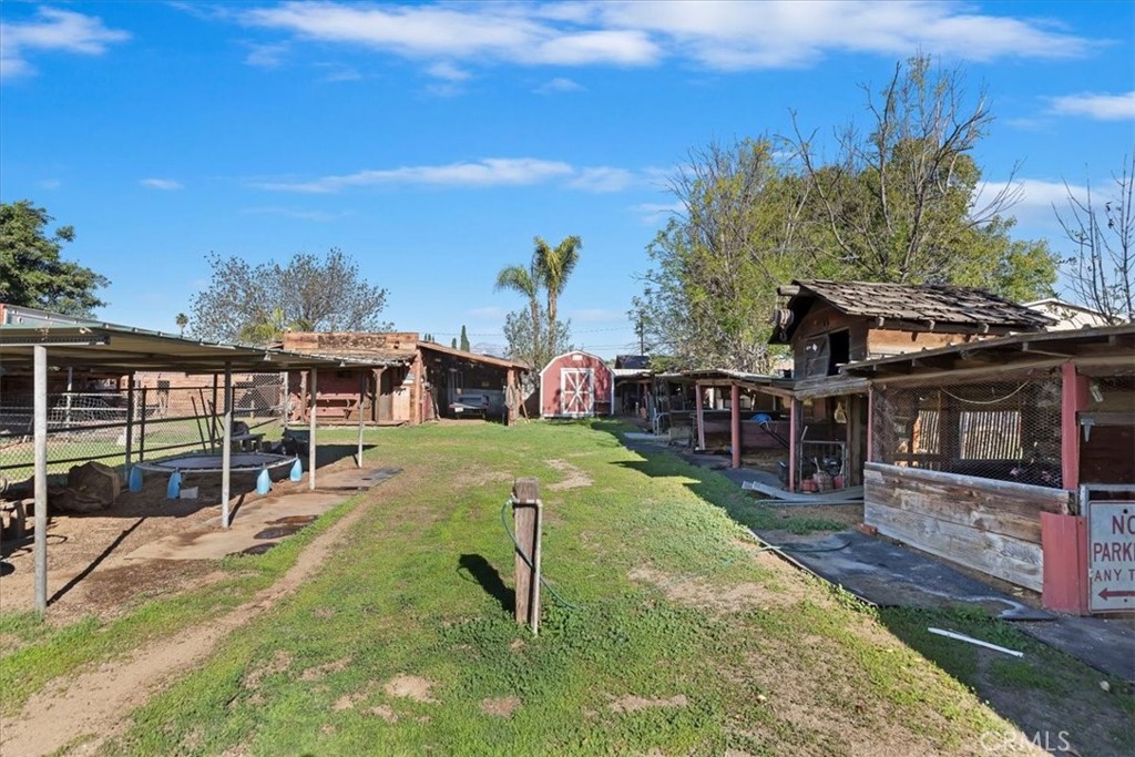 1441 Fifth Street Norco, CA 92860 - Photo 49 of 72 a view of a house with backyard porch and sitting area