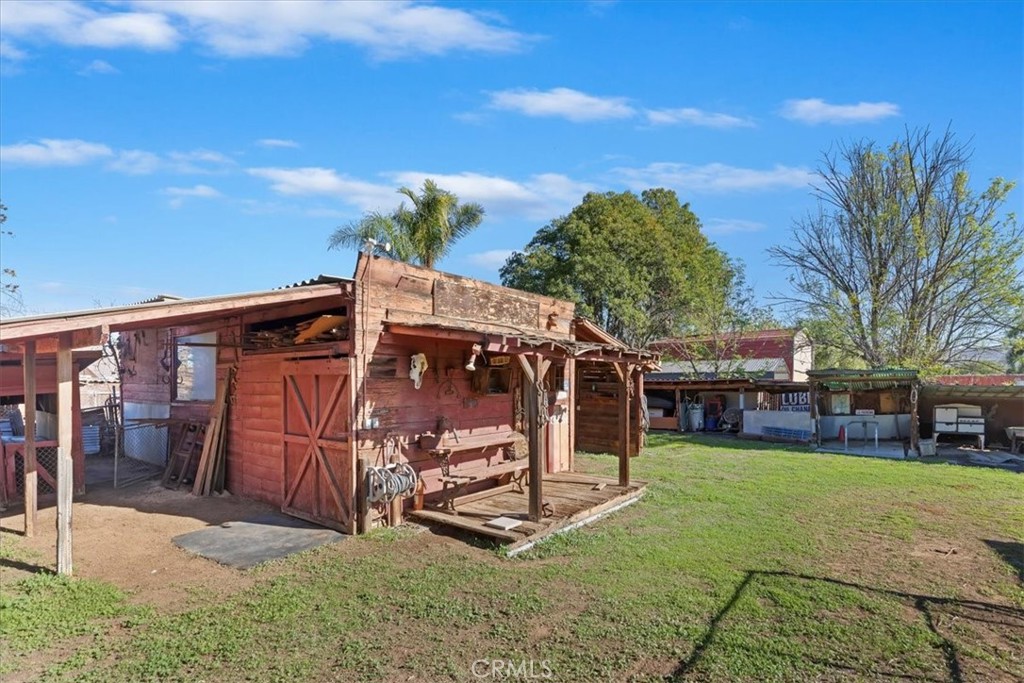1441 Fifth Street Norco, CA 92860 - Photo 52 of 72 a view of a chair and table in the backyard