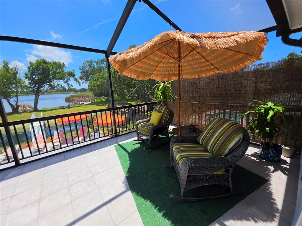 2153 Karan Way Clearwater, FL 33763 - Photo 43 of 65 a view of a two chairs in the patio